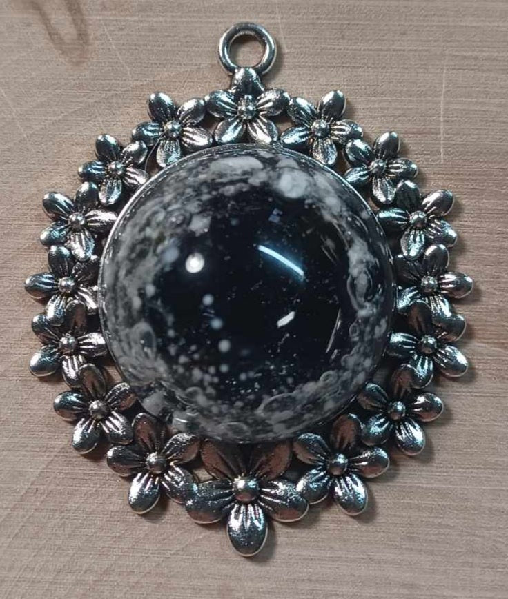 Silver floral backing Ash Pendant